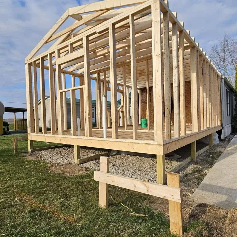 Addition walls and roof trusses framed
