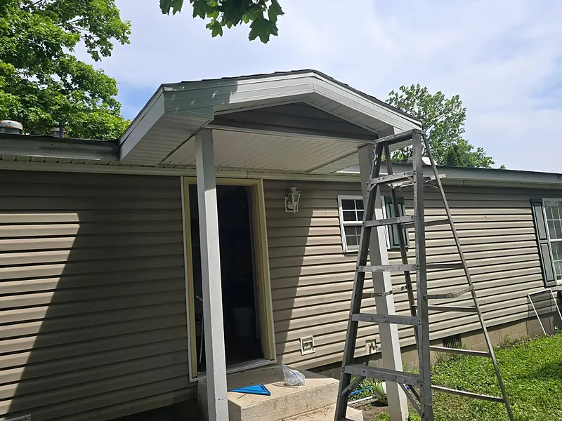 The porch before, with a plywood ceiling